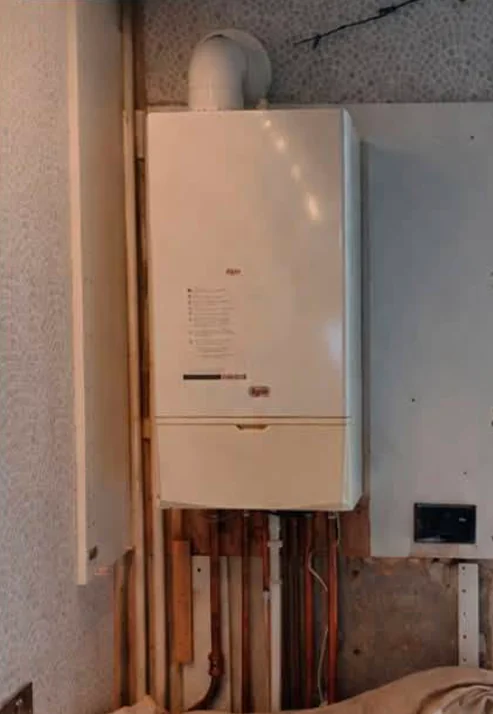 Old Inefficient Boiler Before Replacement in Glasgow Tenement