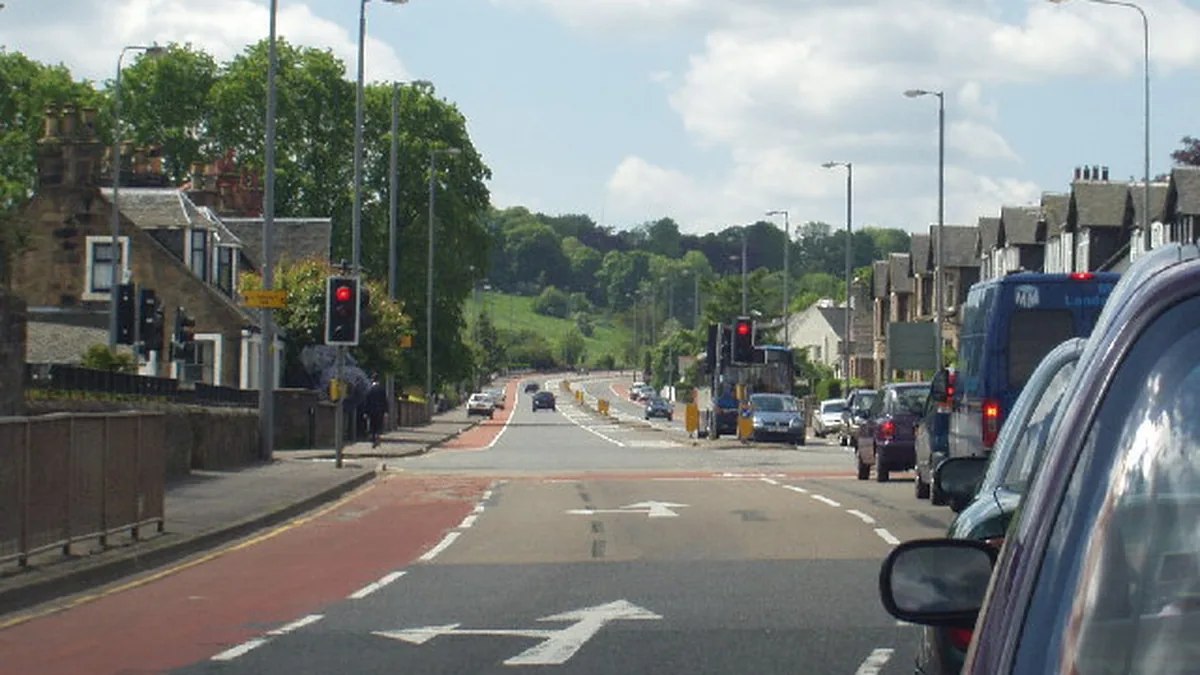 Newton Mearns Glasgow residential housing environment, architectural sandstone characteristics, and local boiler replacement engineering in G77